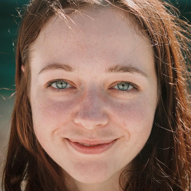 Kaveri Mehta, Lead Design Curator at Mellow Path Field, reviewing corporate floral arrangements